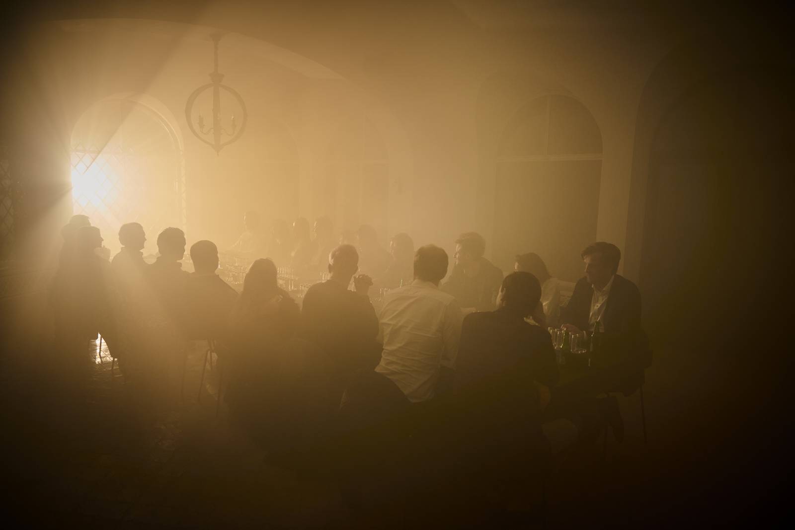 The room filled with haze and blinding light at the climax of the Tabula Rasa dinner